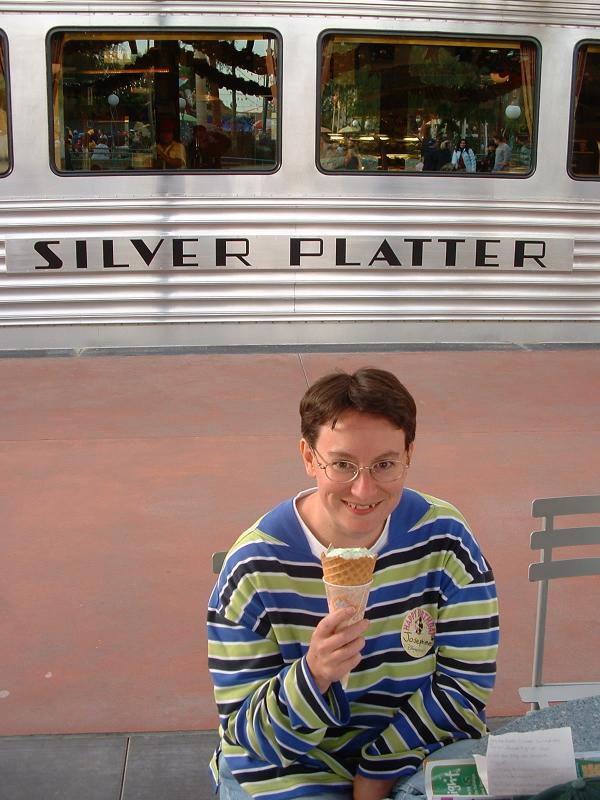 Jo with 'birthday sticker', eating an icecream at Disney's California Adventure