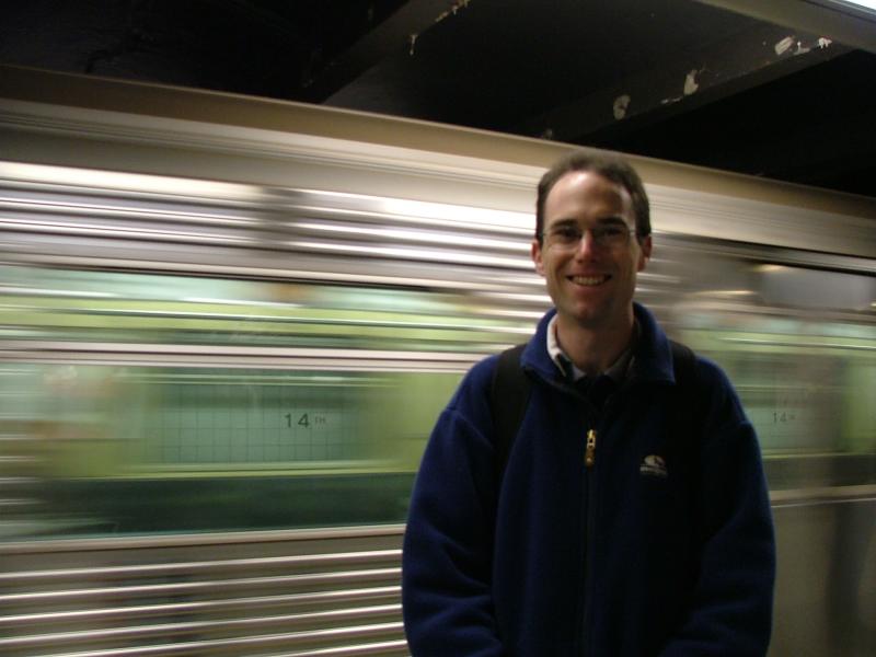 Rob in the 14th street/Union Square subway, with train going by, New York City